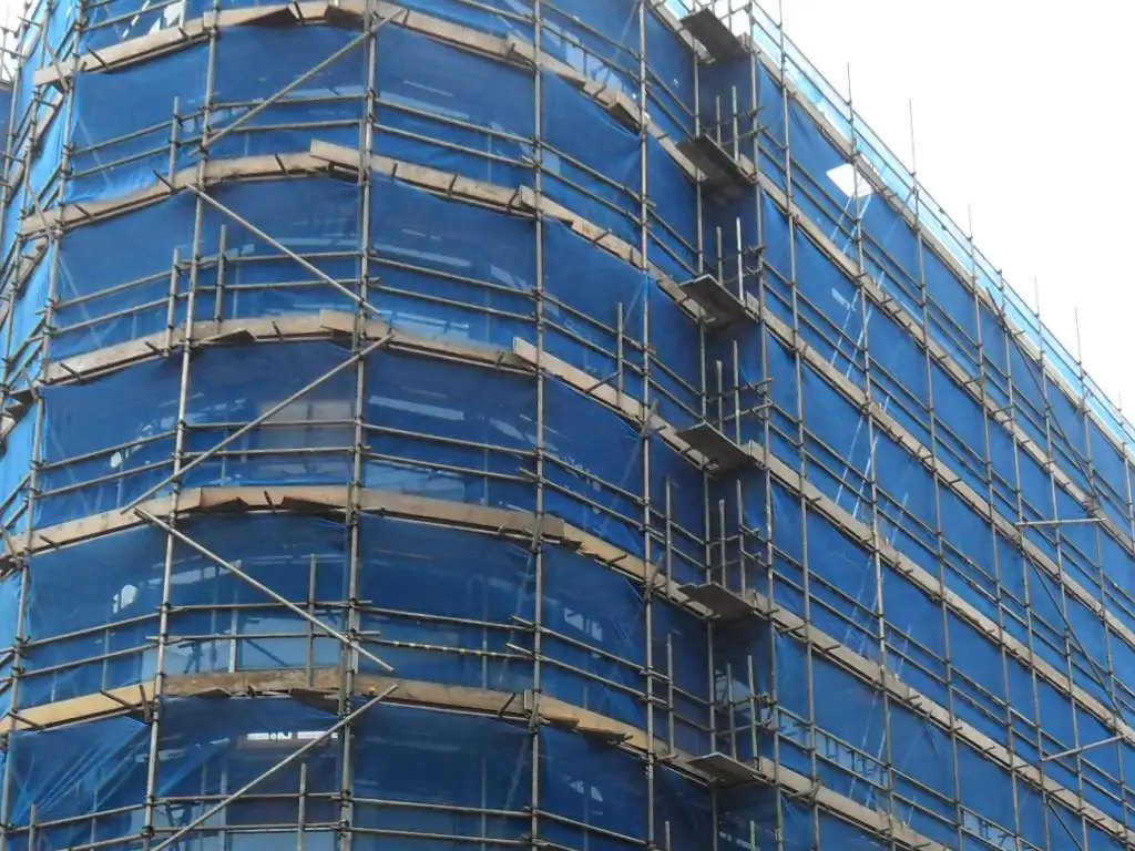 Upper lifts of a fully netted scaffold on a Maidenhead office block