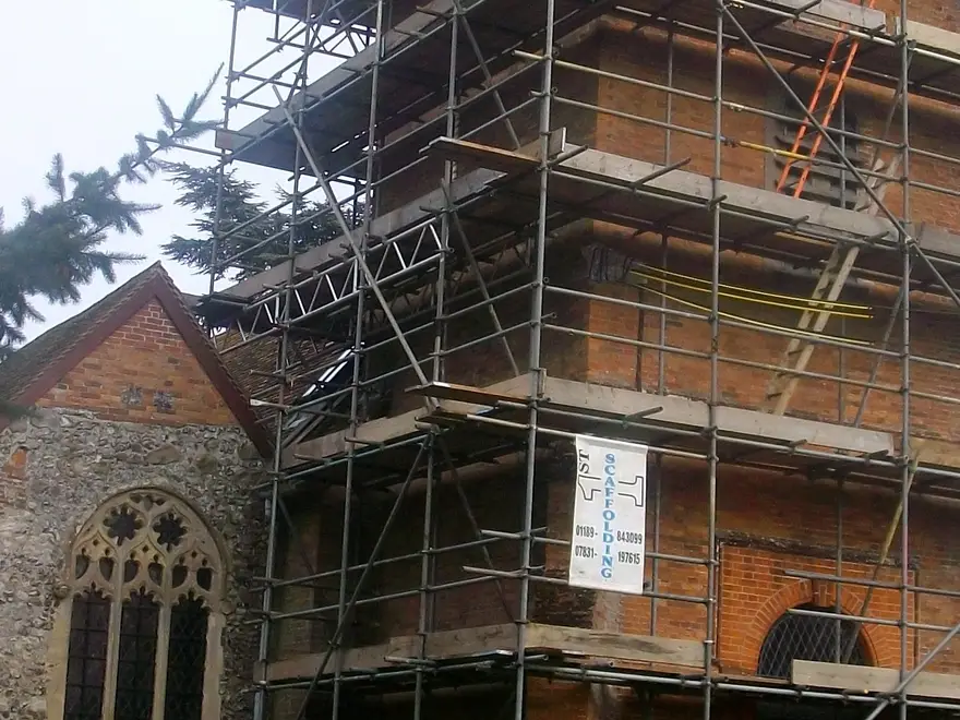 Lattice beam carrying the church tower scaffold over the nave roof in Newbury